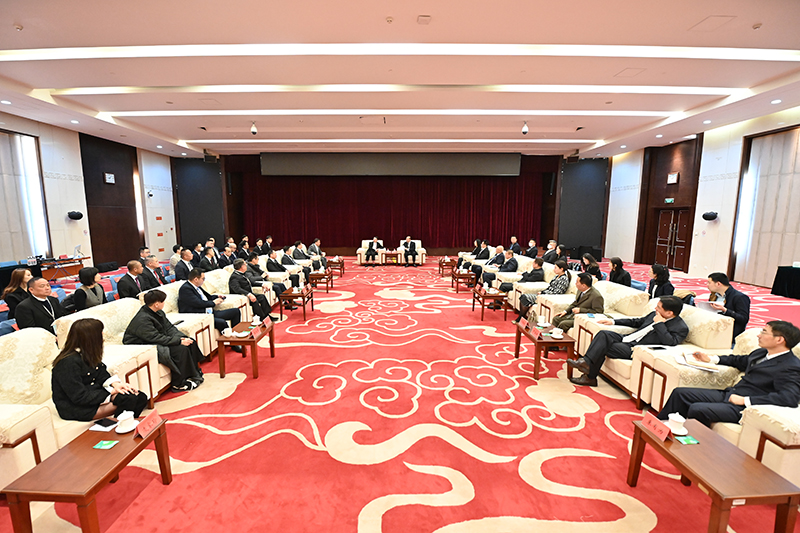 邱小平会见澳门工商联会访京团一行